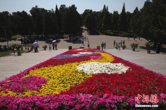 資料圖：“一帶一路”主題花壇。<a target=&apos;_blank&apos; href=&apos;http://www.chinanews.com/&apos; _fcksavedurl=&apos;http://www.chinanews.com/&apos;></table><p align=